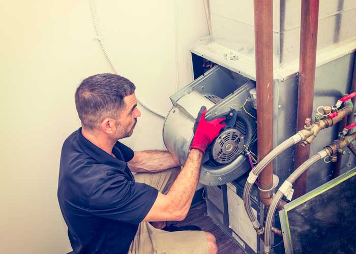 commercial hvac unit being repaired